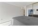 Bedroom with mirrored closet doors and neutral carpet at 1020 15Th St # 15K, Denver, CO 80202