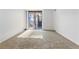 Light bedroom features large glass patio door with balcony and soft carpet for a comfortable retreat at 1020 15Th St # 15K, Denver, CO 80202