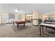 Spacious game room with a pool table, lounge area, and classic decor at 1020 15Th St # 15K, Denver, CO 80202