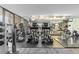 Well-equipped gym with modern cardio machines, free weights, mirrors, and mounted televisions at 1020 15Th St # 15K, Denver, CO 80202