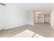Inviting living room featuring plush carpeting, white walls, and modern lighting fixtures at 1020 15Th St # 15K, Denver, CO 80202