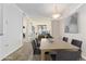 Open-concept living area adjacent to dining room and balcony access at 1020 15Th St # 15K, Denver, CO 80202