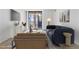 Stylish living room with neutral tones, balcony access, and modern decor at 1020 15Th St # 15K, Denver, CO 80202