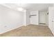 Bright living room with carpet flooring, neutral walls, and minimalist lighting for a calming space at 1020 15Th St # 15K, Denver, CO 80202