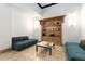 Lobby seating area with bright lighting and custom bookshelf at 1020 15Th St # 15K, Denver, CO 80202