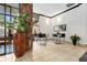 Lobby seating area with greenery and accent stone columns at 1020 15Th St # 15K, Denver, CO 80202