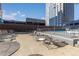 Rooftop pool deck featuring lounge chairs and a seating area with city views at 1020 15Th St # 15K, Denver, CO 80202