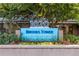 Welcoming signage with beautiful landscaping at Brooks Tower Condominiums at 1020 15Th St # 15K, Denver, CO 80202