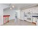 Charming kitchen featuring white appliances, wood-look floors and bright lighting at 5421 E Prescott Ave, Castle Rock, CO 80104