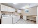 Laundry Room with washer, dryer, and folding table at 5421 E Prescott Ave, Castle Rock, CO 80104