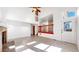 Spacious living room featuring a fireplace, wood-look floors and large windows at 5421 E Prescott Ave, Castle Rock, CO 80104