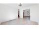Bright living space features modern flooring, recessed lighting, and staircase access at 5421 E Prescott Ave, Castle Rock, CO 80104