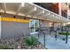 The Circa West building entrance features accessible ramps, signage, and a secure entry for residents and visitors at 1495 Vrain St # 110, Denver, CO 80204