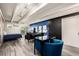 Modern living space with a vibrant accent wall, a comfortable seating area, and ample natural light at 1495 Vrain St # 110, Denver, CO 80204