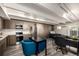 Inviting living space featuring a modern kitchen, dining area, and comfortable seating in a naturally lit open floor plan at 1495 Vrain St # 110, Denver, CO 80204