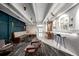 Bright lounge featuring sleek seating, artistic decor, and a welcoming atmosphere at 1495 Vrain St # 110, Denver, CO 80204