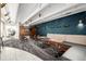 Stylish lounge area with sleek seating, modern lighting, and artistic wall decor at 1495 Vrain St # 110, Denver, CO 80204