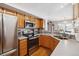Well-equipped kitchen featuring stainless steel appliances, ample counter space, and a convenient layout for cooking at 10654 W Dumbarton Cir # A, Littleton, CO 80127