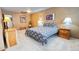 Spacious bedroom with a comfortable bed, ample lighting, and tastefully coordinated decor at 223 S Fuller Placer Rd # 4, Breckenridge, CO 80424