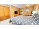 Bedroom with a comfortable bed, wooden furniture, large closet, and neutral wall color at 223 S Fuller Placer Rd # 4, Breckenridge, CO 80424