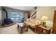 Inviting living room featuring a fireplace, sleeper sofa, and a large window with scenic views at 223 S Fuller Placer Rd # 4, Breckenridge, CO 80424