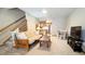 Comfortable living area with adjacent kitchen and a view to the outside at 223 S Fuller Placer Rd # 4, Breckenridge, CO 80424