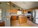 Updated kitchen featuring stainless steel appliances, an island, and lots of storage space at 1295 Hy Vu Dr, Evergreen, CO 80439