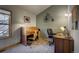 Charming office featuring unique decor, comfortable seating, and a large window at 1295 Hy Vu Dr, Evergreen, CO 80439