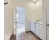 Bright bathroom featuring a shower, neutral walls and modern fixtures at 15274 Milwaukee St, Thornton, CO 80602