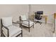 Loft area with comfortable seating and a desk, creating a versatile workspace at 6524 Surry Pl, Parker, CO 80134