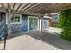 Wooden backyard patio with a pergola, access to the sliding glass door, and privacy at 4512 S Yank St, Morrison, CO 80465