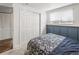 Comfortable bedroom with plush carpet, ample closet space, and natural light from the window at 4512 S Yank St, Morrison, CO 80465