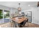 Modern kitchen with a large kitchen island, stainless steel appliances, and plenty of natural light at 4512 S Yank St, Morrison, CO 80465