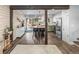 Modern kitchen with an island, stainless steel appliances, and sliding glass doors leading to the patio at 4512 S Yank St, Morrison, CO 80465