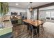Charming kitchen features stainless appliances, granite countertops, and a breakfast bar perfect for entertaining at 4512 S Yank St, Morrison, CO 80465