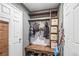 Functional mudroom featuring built-in storage, a bench, and an organizer for coats and shoes at 4512 S Yank St, Morrison, CO 80465