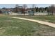 View of the community park with playground equipment and walking path at 4512 S Yank St, Morrison, CO 80465