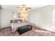 Light and airy bedroom with soft carpet, a ceiling fan, and lots of natural light at 955 Eudora Street St # 108E, Denver, CO 80220