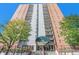 High-rise with brick facade, concrete accents, and balconies at 955 Eudora Street St # 108E, Denver, CO 80220