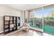Cozy living room with large sliding glass doors leading to a balcony with seating at 955 Eudora Street St # 108E, Denver, CO 80220