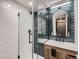 Modern bathroom with a walk-in shower and stylish tile at 3351 S Monaco Pkwy # F, Denver, CO 80222