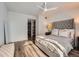 Spacious bedroom with a queen-size bed and in-unit laundry at 3351 S Monaco Pkwy # F, Denver, CO 80222