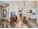 Open concept dining area with glass table and chairs near kitchen at 3351 S Monaco Pkwy # F, Denver, CO 80222