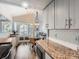 Eat-in kitchen with granite countertops and modern finishes at 3351 S Monaco Pkwy # F, Denver, CO 80222