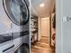 Laundry area with washer, dryer, and ample storage at 3351 S Monaco Pkwy # F, Denver, CO 80222