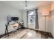 Home office with a desk, two monitors and natural light at 3351 S Monaco Pkwy # F, Denver, CO 80222