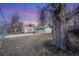 Ranch home with detached garage and expansive yard at 401 S Oak St, Lakewood, CO 80226