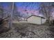 Detached garage in a large backyard setting at 401 S Oak St, Lakewood, CO 80226