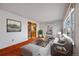 Living room with staged furniture, offering a cozy and inviting atmosphere at 401 S Oak St, Lakewood, CO 80226