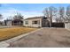 Charming home with a well-manicured lawn and inviting curb appeal, perfect for a Gathering at 1705 W Stoll Pl, Denver, CO 80221